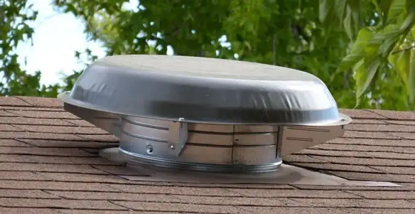 attic fan installation services with low-profile roof ventilation unit in Clearwater, FL