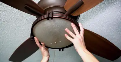 Ceiling fan repair and reinstallation on ceiling mount in Clearwater, FL