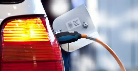 Electric car plugged into EV charger after professional installation in Clearwater, FL