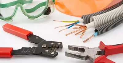 Electrical wiring repair with professional tools and safety equipment in Belleair Beach, FL