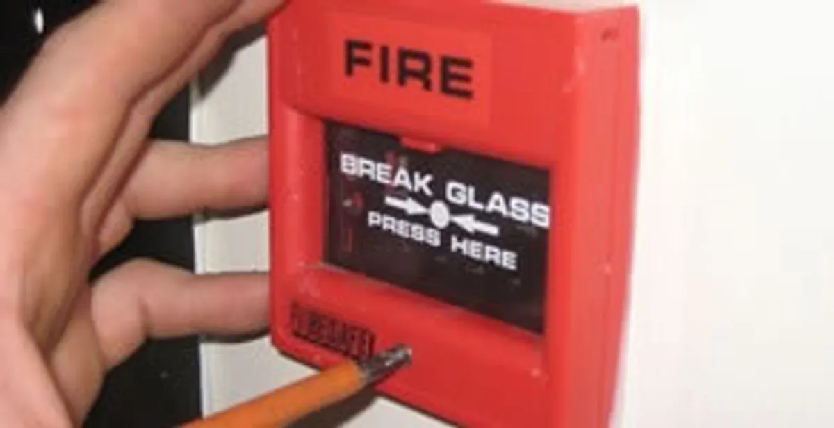 fire alarm installation service showing manual fire alarm pull station installed by licensed electricians in Clearwater, FL