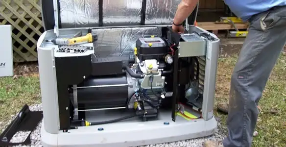 generator installation service showing technician connecting and configuring generator components in Clearwater, FL