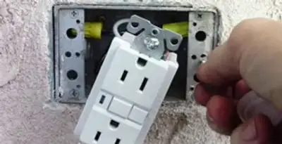 gfci circuits service showing installation of a ground fault circuit interrupter outlet by licensed electricians in Clearwater, FL