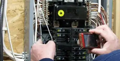 Home electrical inspection of circuit breaker panel by licensed electrician in Clearwater, FL