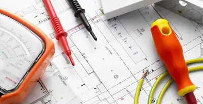 licensed electrician planning and testing electrical systems using professional tools in Clearwater, FL