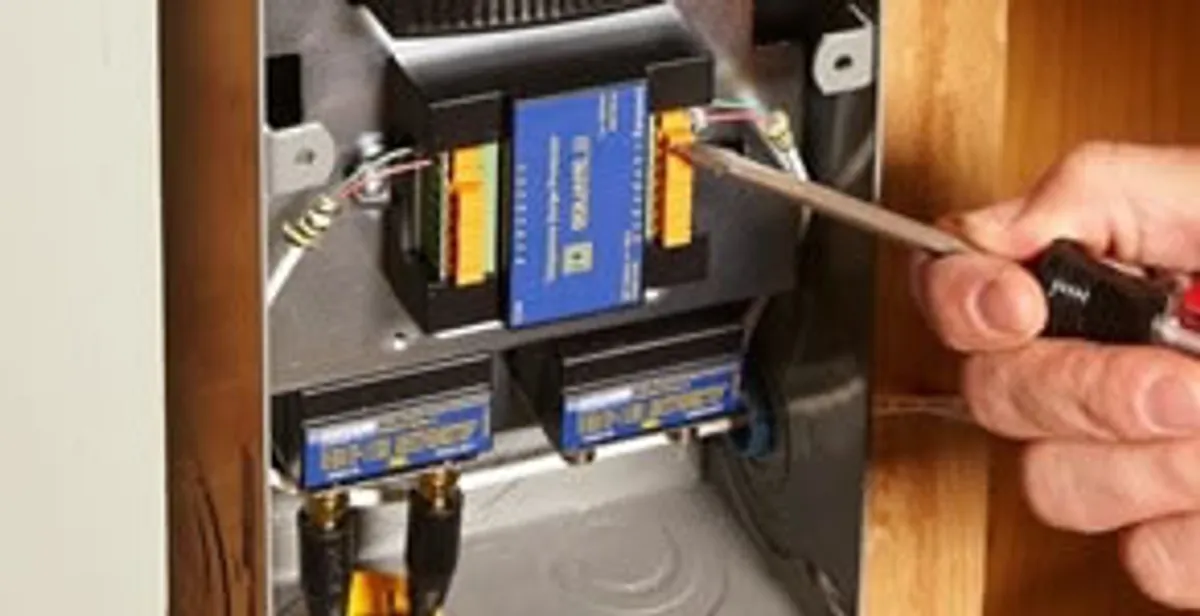Whole home surge protection device being installed by a licensed electrician to protect electrical systems in Clearwater, FL